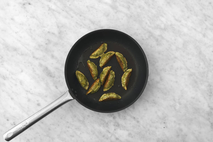 Cook the gyozas