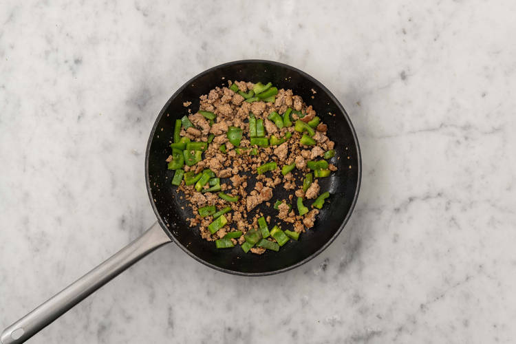 Cuire la dinde et les poivrons