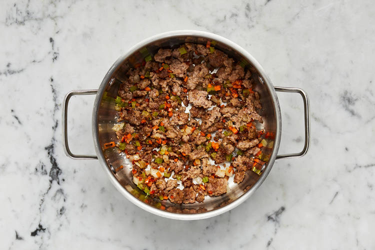 Cook sausage and veggies