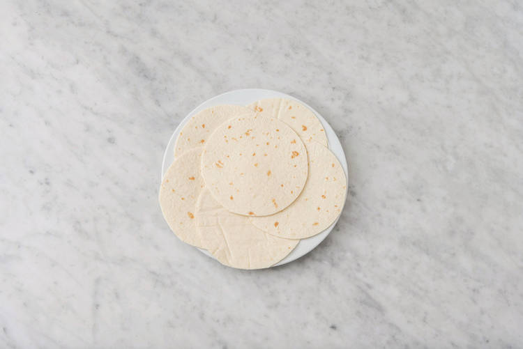 Toss salad & heat tortillas