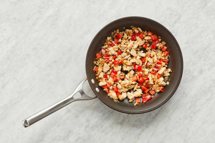 Cook chicken and veggies