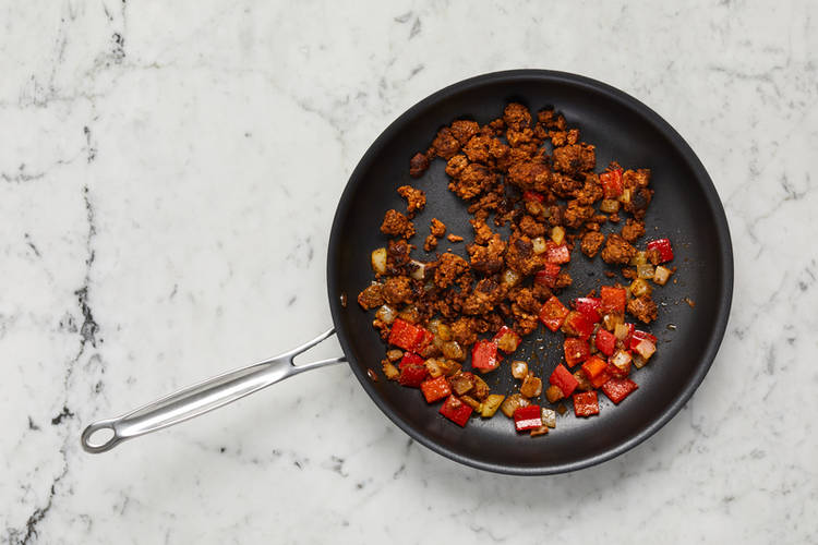 Cuire le chorizo et les légumes