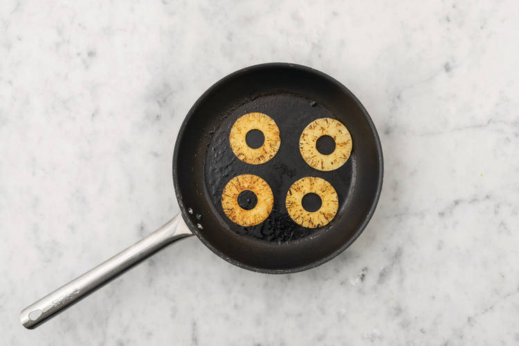 Char the pineapple & caramelise the onion