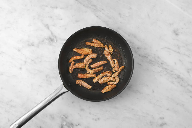 Cook the plant-based crumbed chicken & bake pita