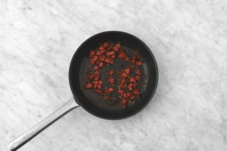 Cook the onion & chorizo