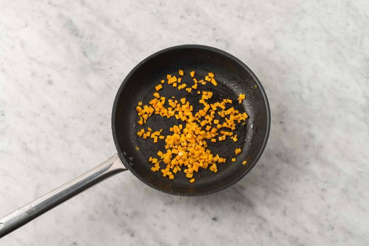 Cook peppers and chicken