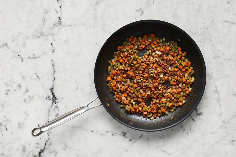 Cook sausage and veggies