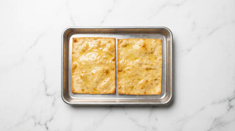 Toast Flatbreads & Make Salad