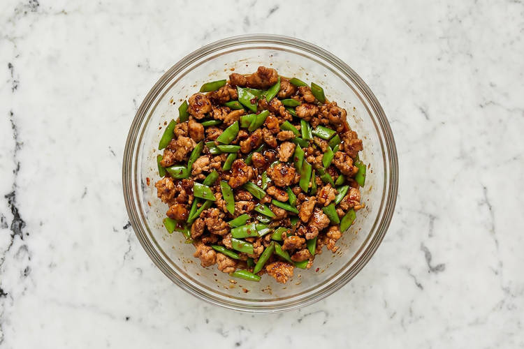 Cook pork and peas