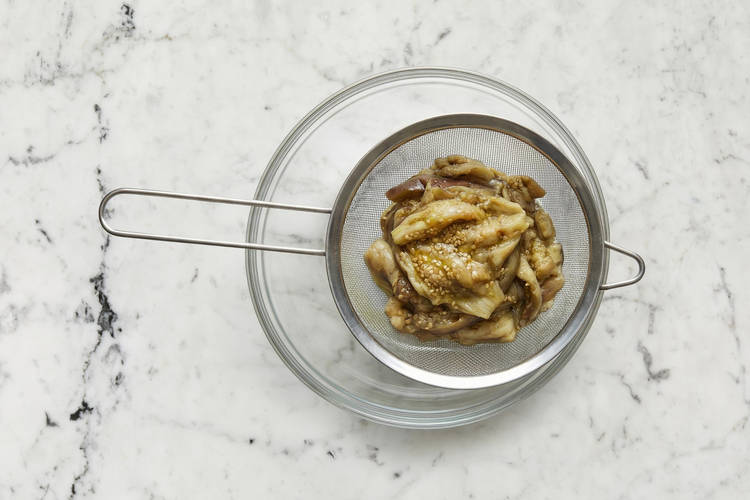 Strain eggplant and roast koftas