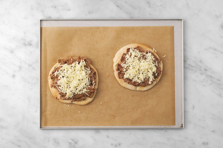 Cook the cheeseburger flatbreads & halloumi