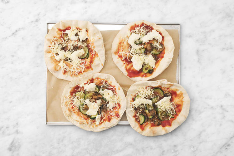 Enfourner les pizzas