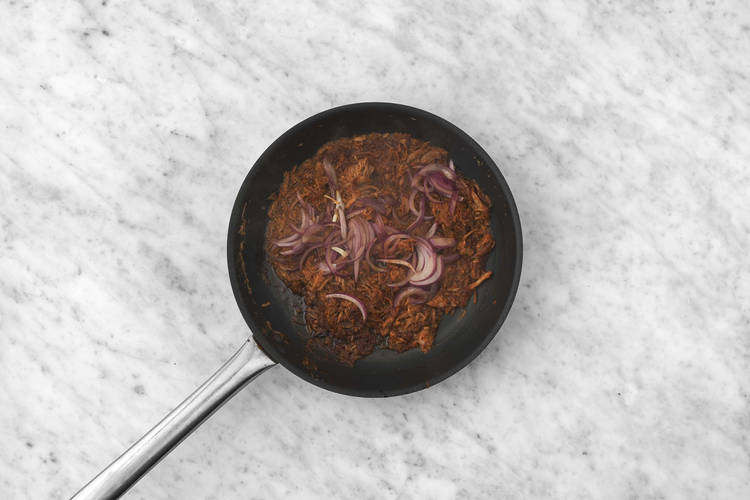 Fry the pulled chicken