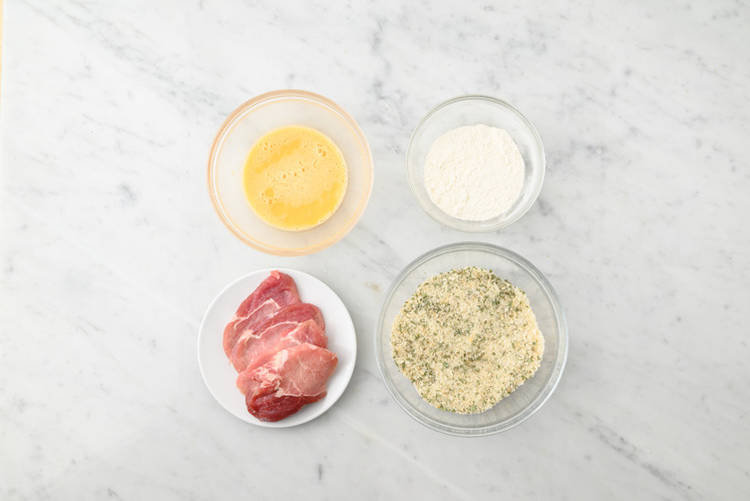 Crumb the pork schnitzel