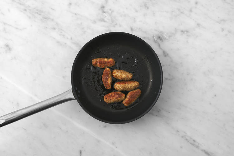 Cook the beef sausages