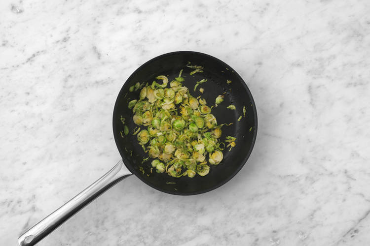 Cook the thyme Brussels sprouts
