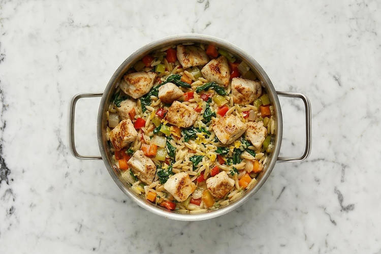 Simmer chicken and orzo