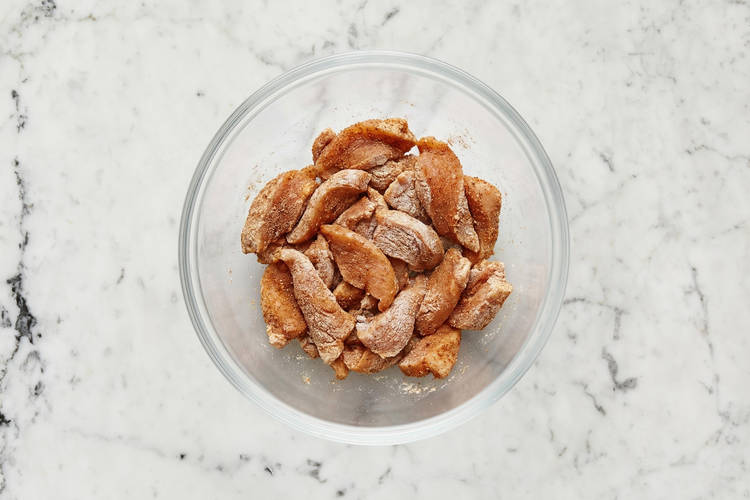 Cut and coat chicken