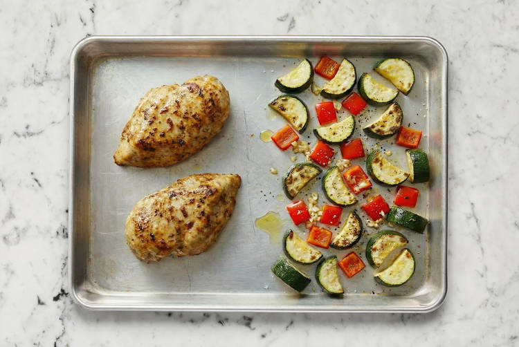 Cook chicken and veggies