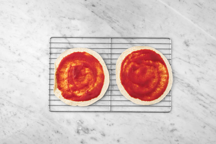 Assemble the pizza