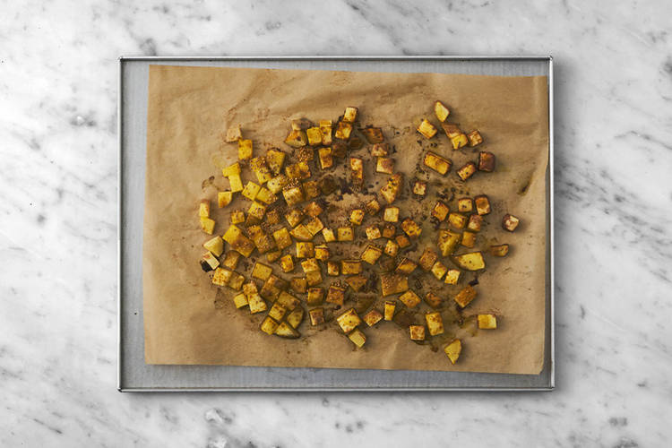 Bake the spiced potato
