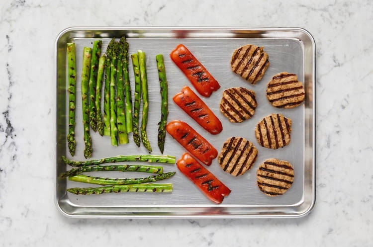 Grill patties, peppers and asparagus