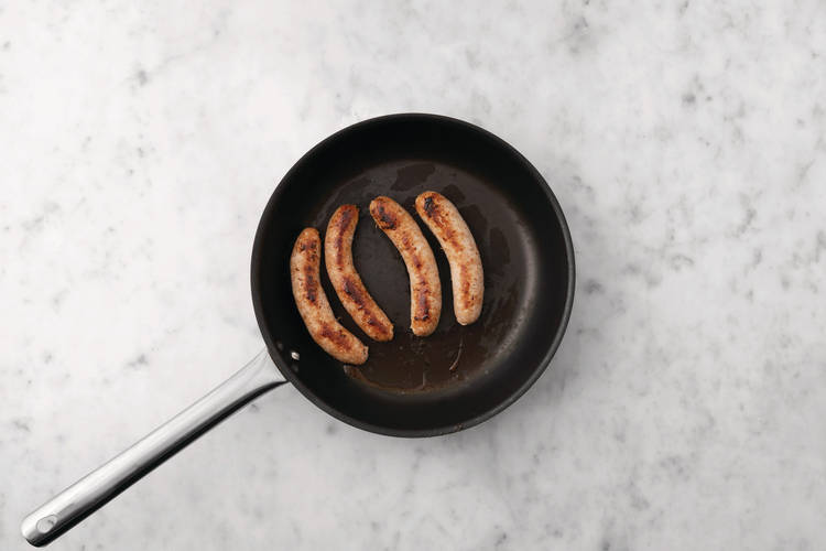 Cook the pork sausages