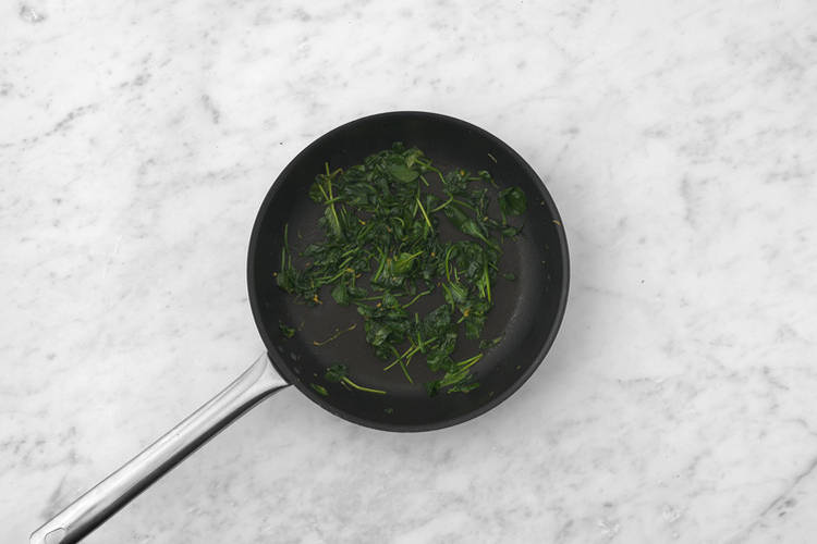 Cook the baby spinach