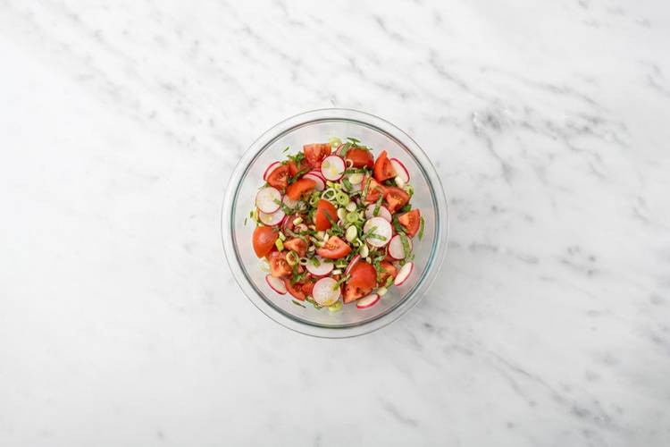 Toss the tomato salad