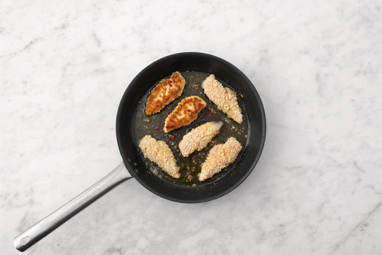 Crumb and cook the chicken