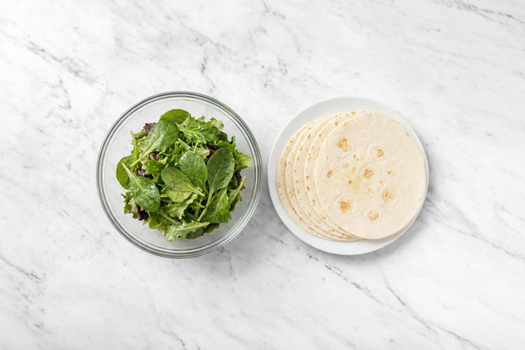 Dress the salad & heat the tortillas