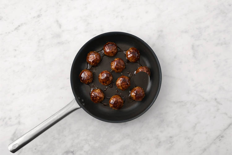 Glaze the meatballs