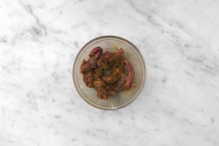 Coat the prawns