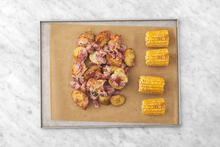 Roast the potatoes & corn