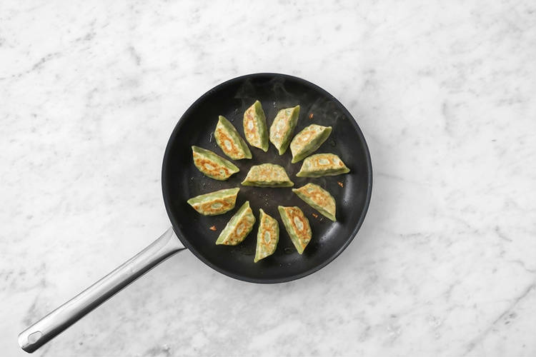 Cook the gyozas