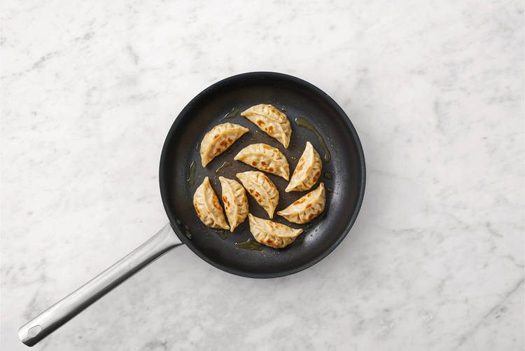 Cook the gyozas