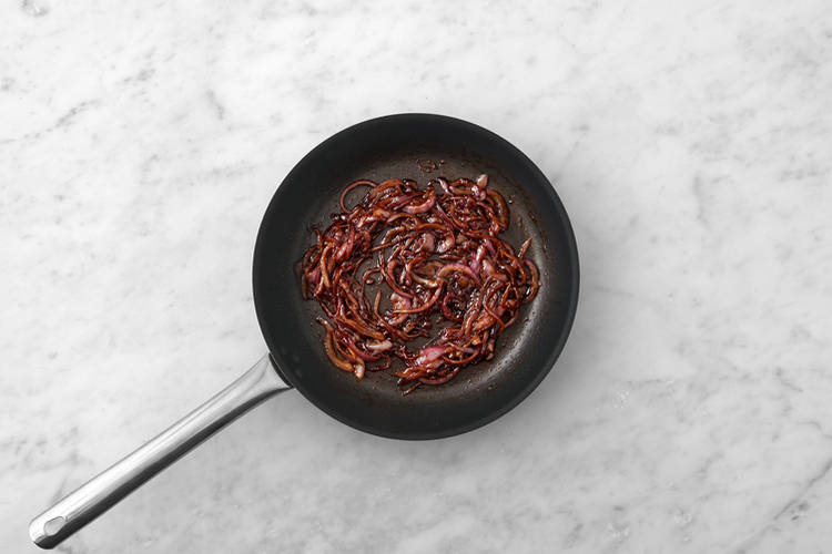 Caramelise the red onion