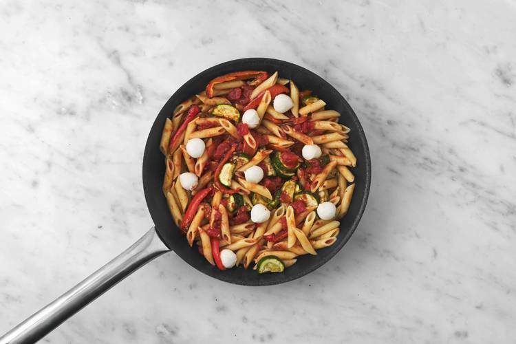 Bake pasta and make garlic toasts
