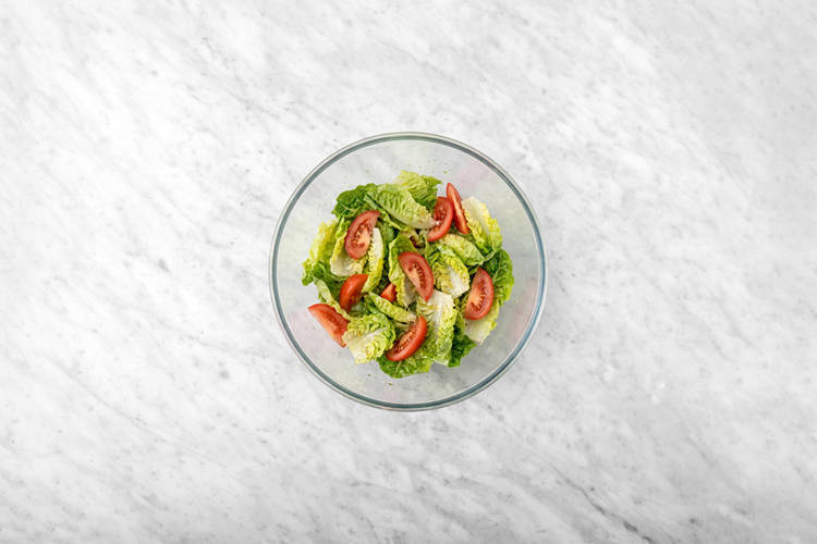Heat the tortillas & toss the salad
