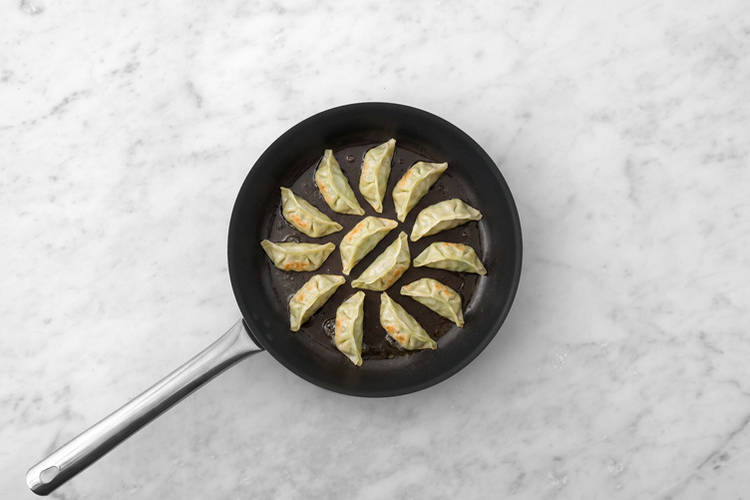 Cook the gyozas