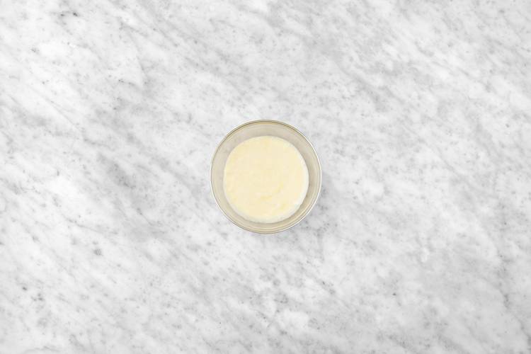 Cook pizza and make dip