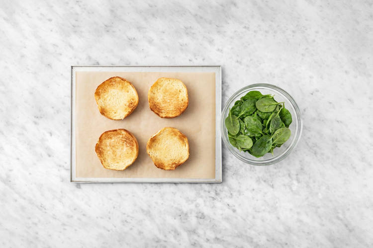 Toast the buns & toss the spinach