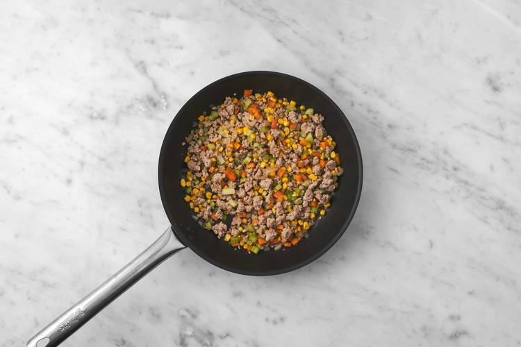 Cook beef and veggies