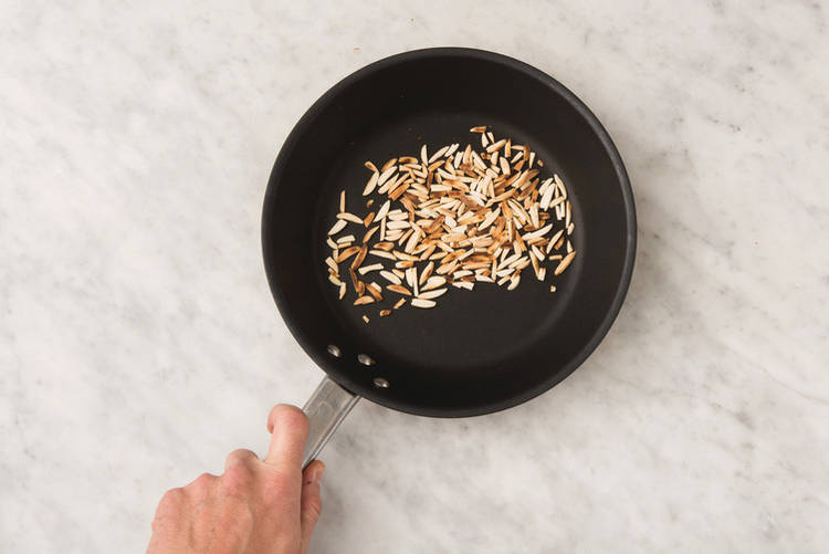 Toast almonds & make sauce