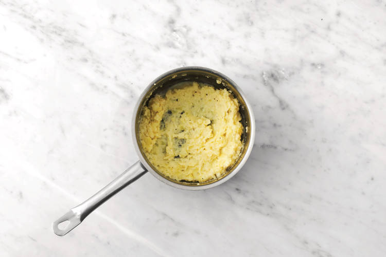 Make the cheesy mash