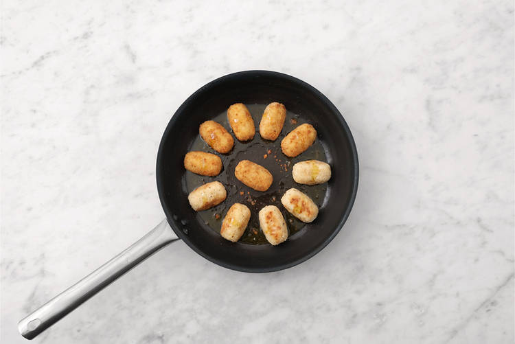 Cook the croquetas
