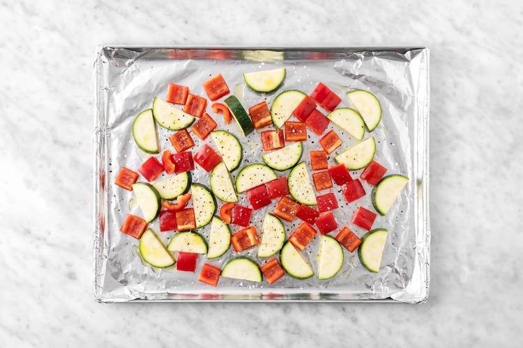 Broil peppers and zucchini