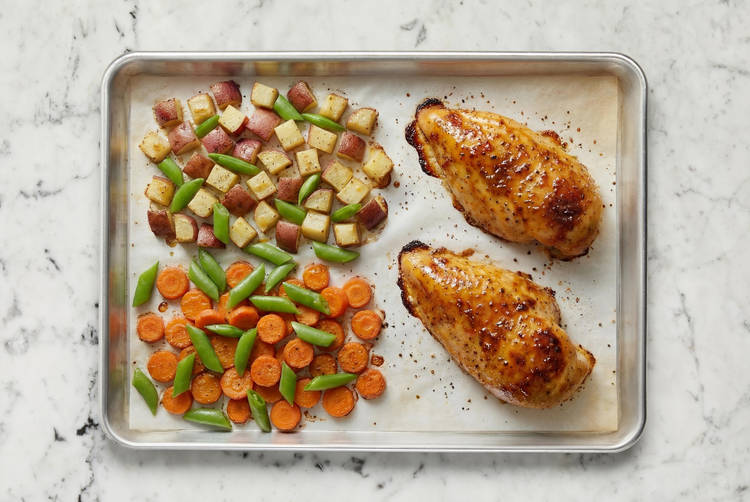 Glaze chicken and finish roasting veggies