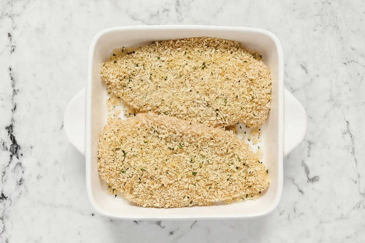Flatten and coat chicken