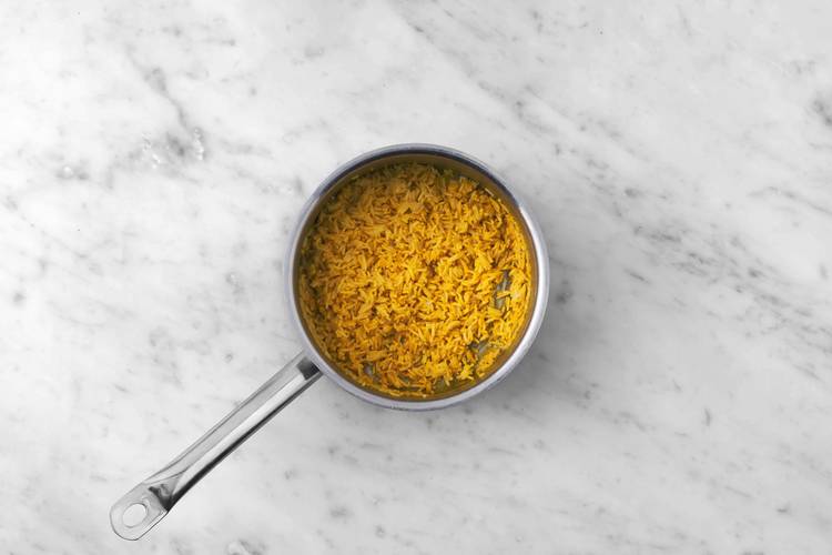 Cook coconut rice